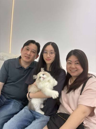 Ragdoll family with their CatzillaSG kitten in Singapore